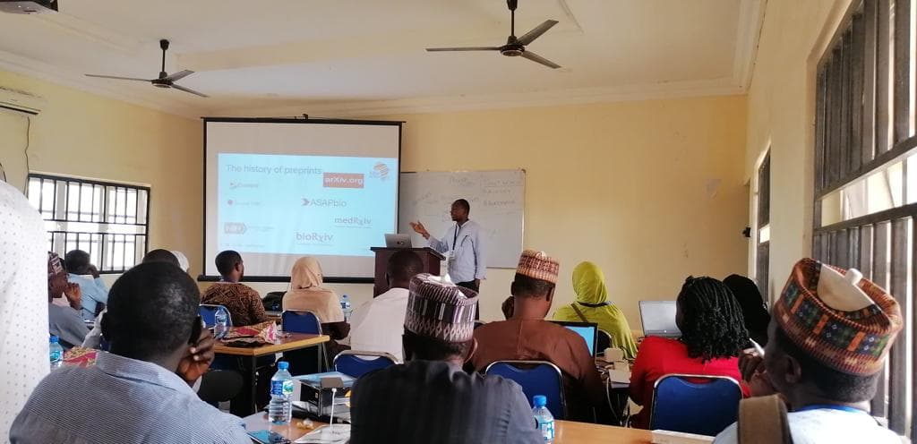 Speaker presenting at the Open Science Community Nigeria conference